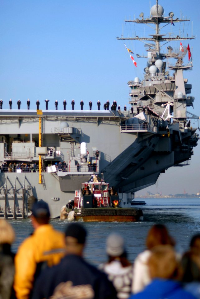 US Navy 071105-N-4515N-054 Sailors aboard USS Harry S. Truman (CVN 75) man the rails as they leave port at Naval Station Norfolk in support of maritime security operations