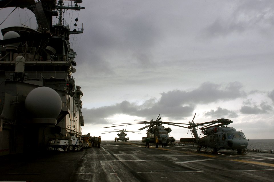 US Navy 071103-N-1831S-027 Amphibious assault ship USS Kearsarge (LHD 3) prepares to launch a UH-1N Huey and two CH-53E Sea Stallion helicopters assigned to Marine Medium Helicopter Squadron (HMM) 261