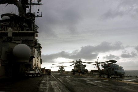 US Navy 071103-N-1831S-027 Amphibious assault ship USS Kearsarge (LHD 3) prepares to launch a UH-1N Huey and two CH-53E Sea Stallion helicopters assigned to Marine Medium Helicopter Squadron (HMM) 261