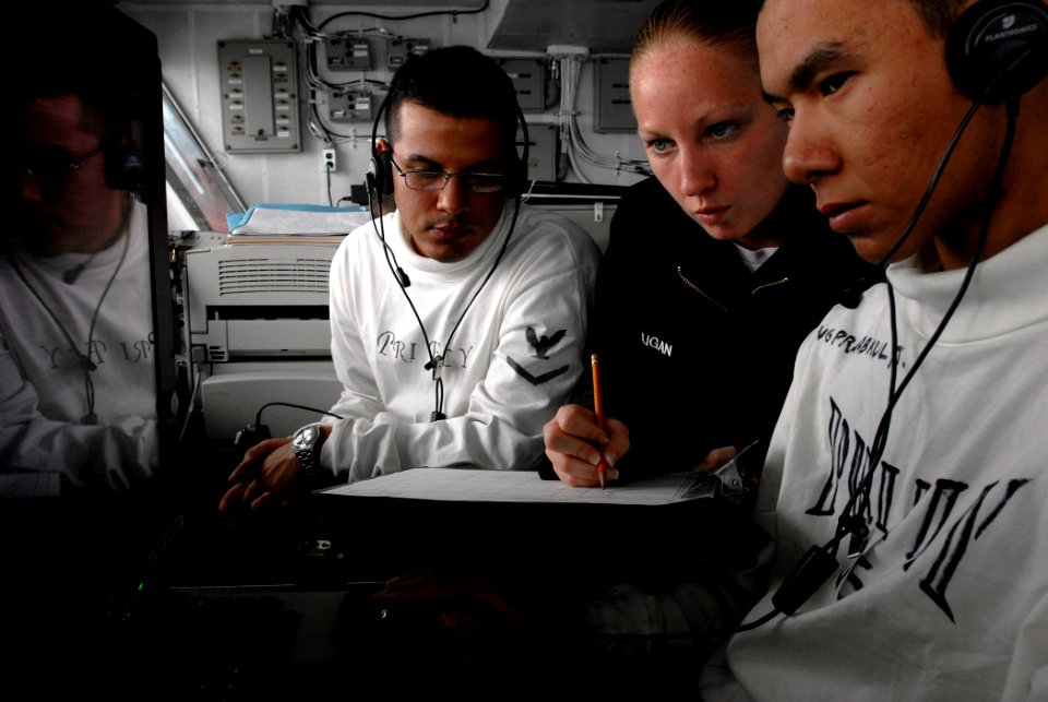 US Navy 071108-N-4776G-067 Aviation Boatswain's Mate 3rd Class Heather Milligan, instructs a group of sailors on tracking aircraft aboard the Nimitz-class aircraft carrier USS Ronald Reagan (CVN 76)