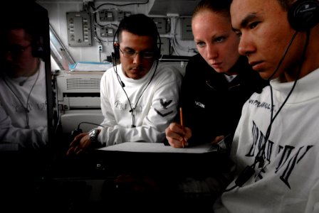 US Navy 071108-N-4776G-067 Aviation Boatswain's Mate 3rd Class Heather Milligan, instructs a group of sailors on tracking aircraft aboard the Nimitz-class aircraft carrier USS Ronald Reagan (CVN 76)
