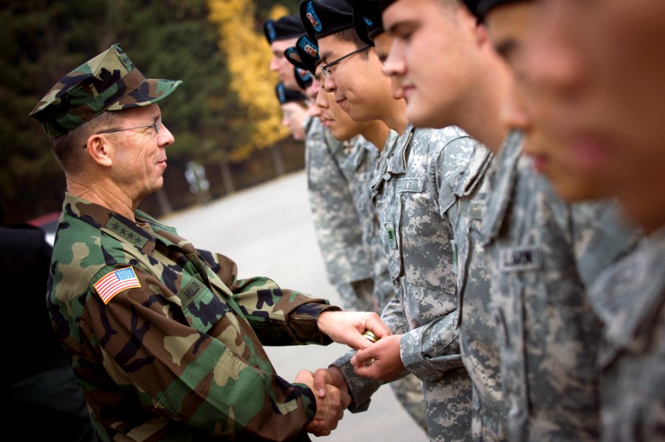 US Navy 071105-N-0696M-301 Chairman of the Joint Chiefs of Staff, Adm. Mike Mullen greets soldiers after a tour of the Demilitarized Zone separating North and South Korea
