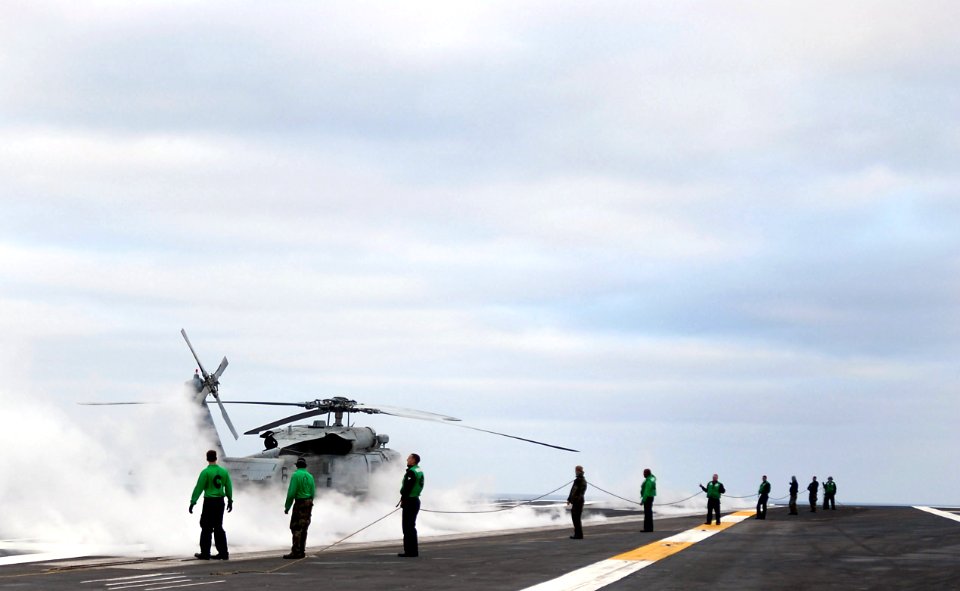 US Navy 071106-N-3659B-087 Flight deck personnel prepare for flight operations aboard Nimitz-class aircraft carrier USS Ronald Reagan (CVN 76). Reagan is underway in the Pacific Ocean conducting flight deck certification