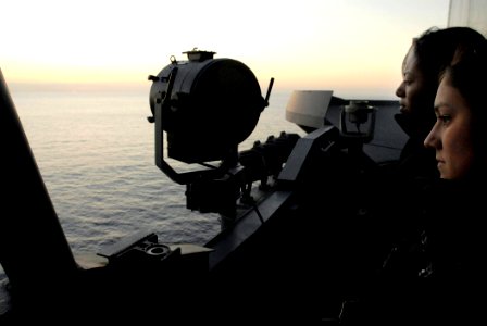 US Navy 071105-N-4133B-044 Seaman Ana Orozco and Seaman Vanessa Ramirez-Smith stand forward lookout watch aboard Nimitz-class aircraft carrier USS Ronald Reagan (CVN 76)