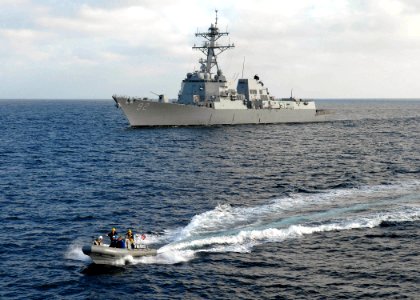 US Navy 071105-N-7981E-163 A rigid hull inflatable boat from Arleigh Burke-class guided-missile destroyer USS Momson (DDG 92) approaches USS Shoup (DDG 86) during a personnel transfer
