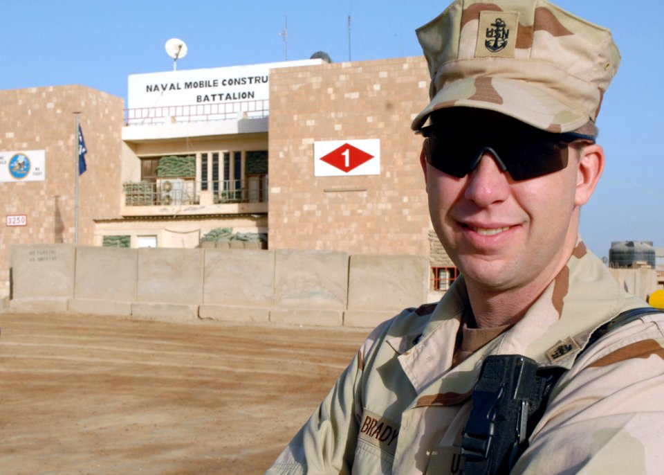 US Navy 071112-N-3857R-001 Chief Navy Counselor James Brady, assigned to Naval Mobile Construction Battalion (NMCB) 1, stands outside the deployed unit's headquarters