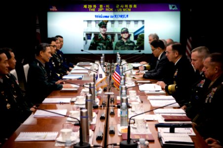 US Navy 071106-N-0696M-169 Chairman of the Joint Chiefs of Staff, Adm. Mike Mullen and Korean Chairman of the Joint Chiefs of Staff, Gen. Kim Kwan-Jin open the 29th Military Committee Meeting