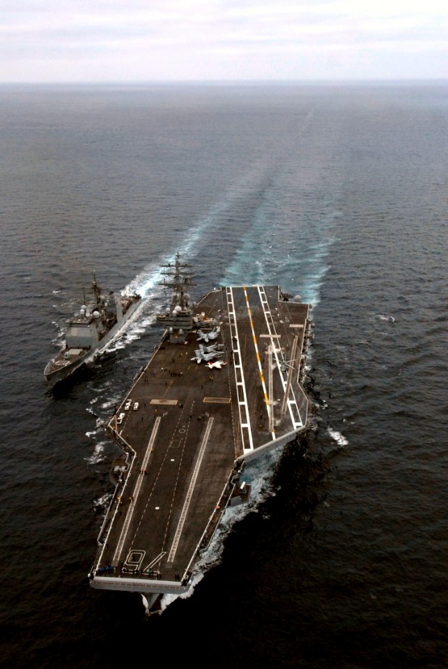 US Navy 071106-N-4776G-157 Nimitz-class aircraft carrier USS Ronald Reagan (CVN 76) conducts a fueling at sea (FAS) with guided-missile cruiser USS Chancellorsville (CG 62)