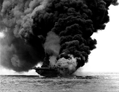 USS Bunker Hill (CV-17) afire after being hit by Kamikazes off Okinawa, 11 May 1945 (80-G-274266)