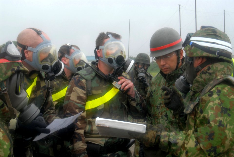 US Navy 071110-N-4649C-001 U.S. Navy and Japan Ground Self Defense Force (JGSDF) security personnel work together during Exercise Keen Sword 08