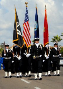 US Navy 071110-N-9909C-001 The color guard assigned to amphibious assault ship USS Boxer (LHD 4) marches in the 21st annual Veterans Day Parade photo