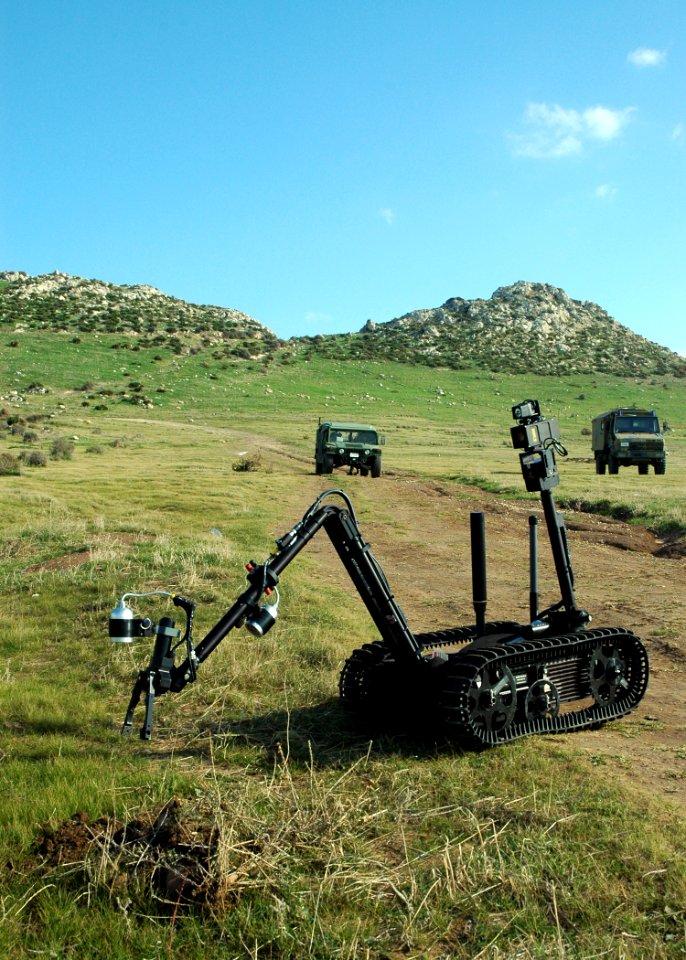 US Navy 071114-N-0577G-007 During a route clearance exercise, technicians from Explosive Ordnance Disposal Mobile Unit (EODMU) 8 operate the MK II Talon robot to investigate an improvised explosive device (IED)