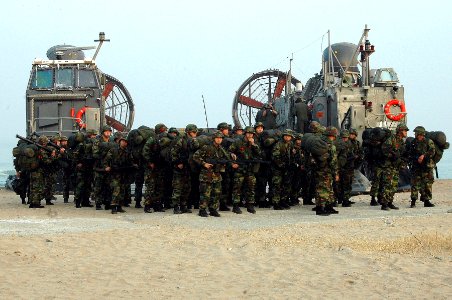US Navy 071114-N-9177B-002 Republic of Korea (ROK) Marines assigned to the 7th Marine Regiment, 2nd Battalion, 1st Marine Division, disembark from a U.S. Navy landing craft air cushion