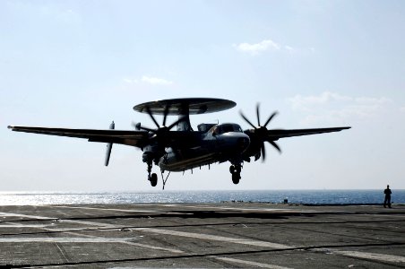 US Navy 071112-N-3136P-031 An E-2C Hawkeye, assigned to Carrier Airborne Early Warning Squadron (VAW) 115, prepares to make a landing aboard the aircraft carrier USS Kitty Hawk (CV 63)