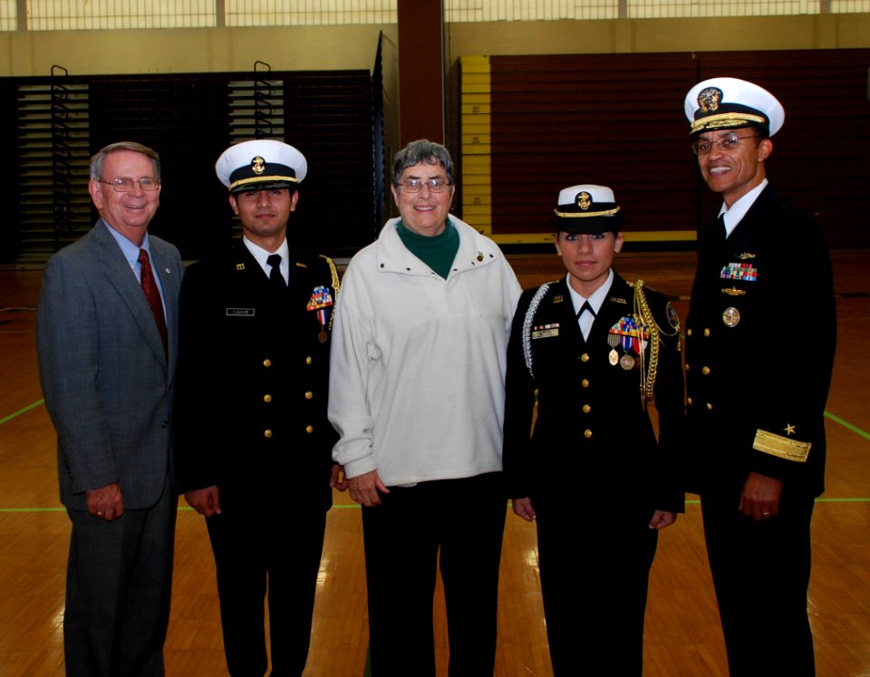 US Navy 071115-N-3090M-001 New London Deputy Mayor Kevin Cavanaugh, JROTC Executive Officer Muhammad Tahir, New London Mayor Margaret Mary Curtin, and JROTC Commanding Officer Vannessa Blanco, pose with Submarine Group 2's Comm