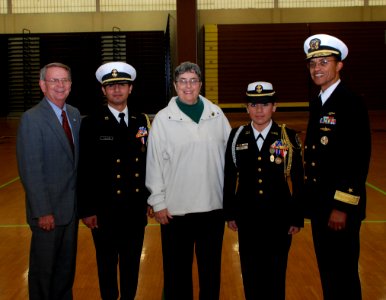 US Navy 071115-N-3090M-001 New London Deputy Mayor Kevin Cavanaugh, JROTC Executive Officer Muhammad Tahir, New London Mayor Margaret Mary Curtin, and JROTC Commanding Officer Vannessa Blanco, pose with Submarine Group 2's Comm