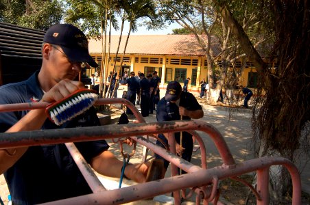 US Navy 071116-N-0807W-214 Mine countermeasures ship USS Patriot (MCM 7) and USS Guardian (MCM 5) Sailors renovate playground equipment at the School for Blind Children of Hai Phong, during a community service project