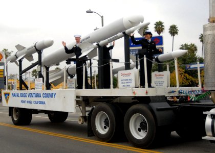 US Navy 071111-N-8607R-024 Sailors from Naval Base Ventura County Point Mugu stand on the base's missile float and wave to the spectators at the fourth annual San Fernando Valley Veterans Day Parade