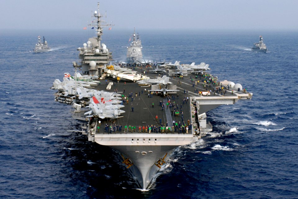 US Navy 071116-N-7883G-236 The aircraft carrier USS Kitty Hawk (CV 63) and other American and Japan Maritime Self-Defense Forces (JMSDF) ships transit together at the end of ANNUALEX 19G, the maritime component of the U.S.-Japa