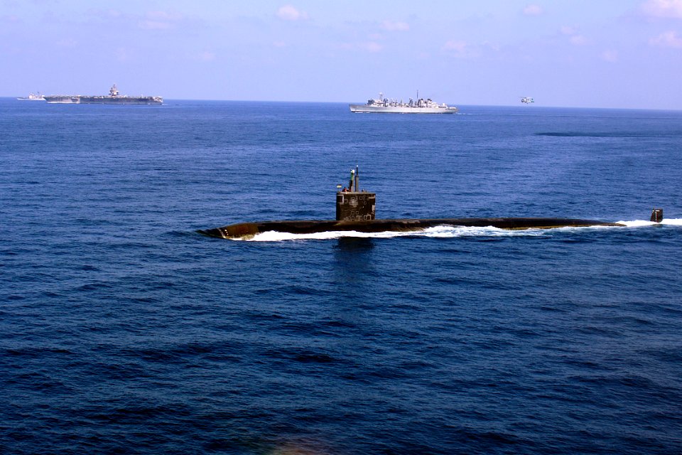 US Navy 071113-N-8132M-009 The nuclear-powered attack submarine USS Miami (SSN 755) steams through the Arabian Sea