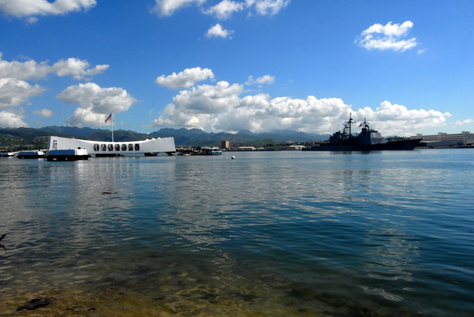US Navy 071112-N-9758L-083 Sailors aboard the Ticonderoga-class guided-missile cruiser USS Port Royal (CG 73) render honors as she passes the USS Arizona Memorial