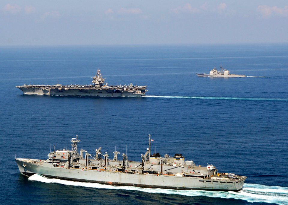 US Navy 071113-N-8132M-008 The nuclear-powered aircraft carrier USS Enterprise (CVN 65), Military Sealift Command fast combat support ship USNS Supply (T-AOE 6), and Guided-missile cruiser USS Gettysburg (CG 64) steam through t