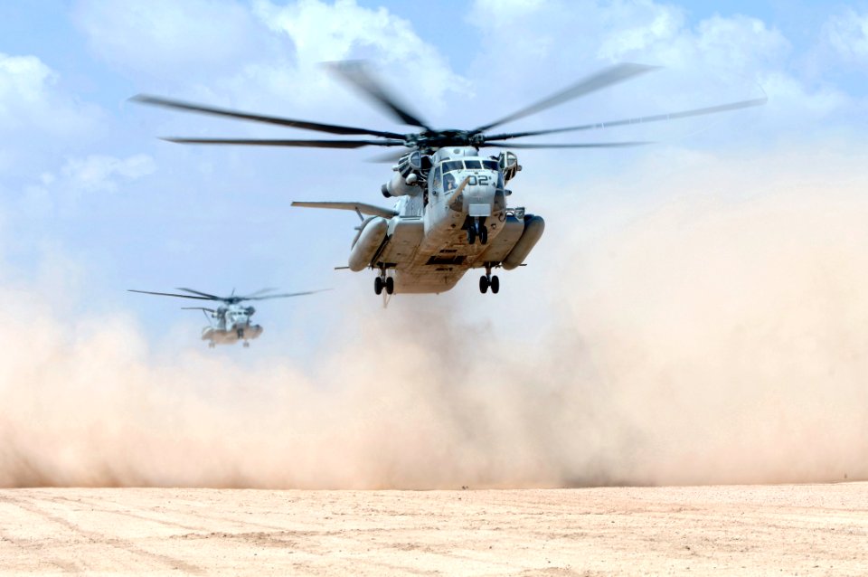 US Navy 071112-F-0509T-003 Two U.S. Marine Corps CH-53 helicopters, assigned to the 464th Marine Heavy Helicopter Squadron, Combined Joint Task Force-Horn of Africa (CJTF-HOA), carry distinguished visitors and CJTF-HOA Leadersh