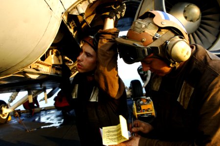 US Navy 071121-N-1598C-101 Sailors perform safety checks on an S-3B Viking, attached to the