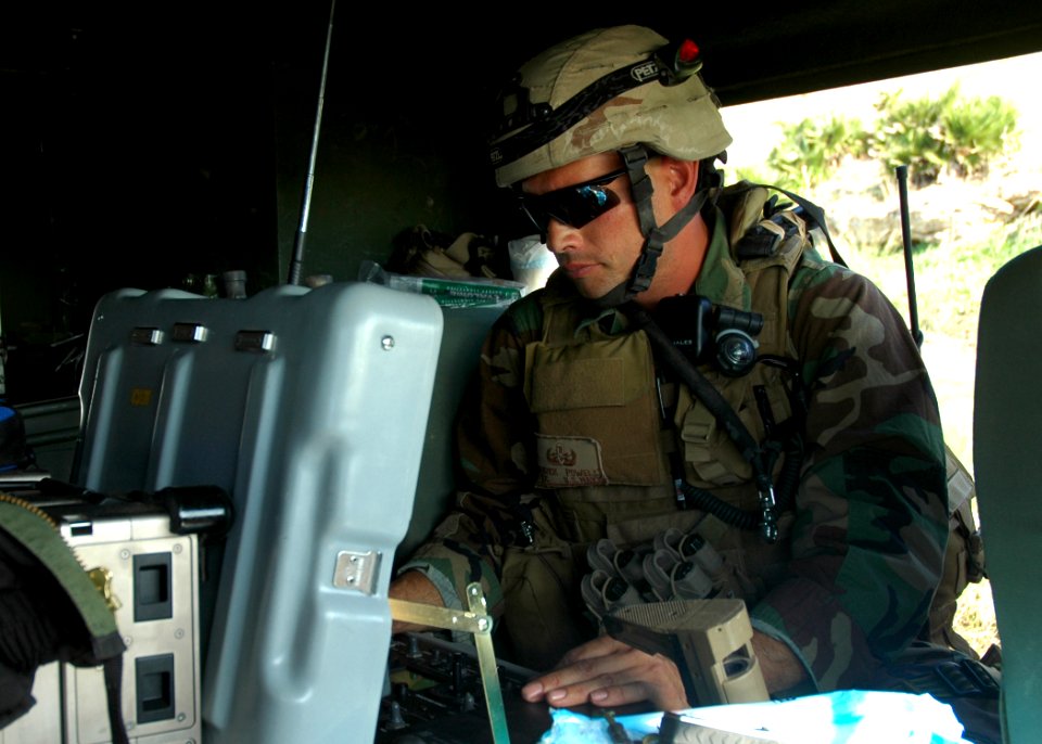 US Navy 071114-N-0577G-004 During a route clearance exercise, Chief Explosive Ordinance Disposal Technician Derrick A. Powell, assigned to Explosive Ordinance Disposal Mobile Unit (EODMU) 8, Det. 18, remotely inspects an improv