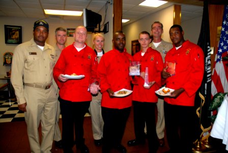 US Navy 071113-N-8102J-379 Team members Culinary Specialist 2nd Class Patrick Faucette, Culinary Specialist 1st Class Preston Charles, Culinary Specialist Seaman Anthony Wilcox and Culinary Specialist 1st Class Robert Jackson J photo