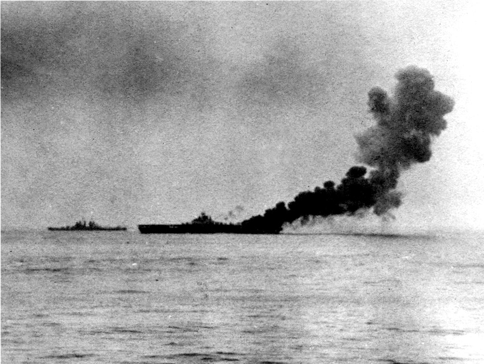 USS Bunker Hill (CV-17) burns after first kamikaze hit 11 May 1945