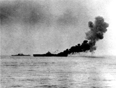 USS Bunker Hill (CV-17) burns after first kamikaze hit 11 May 1945