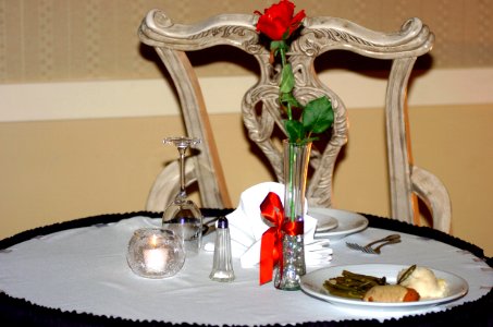 US Navy 071114-N-6676S-018 A meal is set on an empty table in remembrance of POWs-MIAs, both past and present photo
