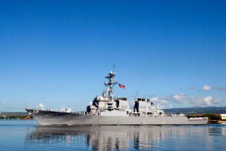US Navy 071112-N-6674H-007 Sailors aboard guided-missile destroyer USS Hopper (DDG 70) man the rails as the ship departs Naval Station Pearl Harbor for deployment