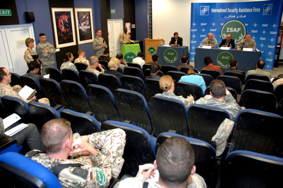 US Navy 071113-F-0000X-010 Gov. Arsala Jamal, along with Navy Cmdr. Dave Adams and Lt. Col. Scott Custer, holds a press conference for the international press to explain the successes the three have had in rebuilding Khost