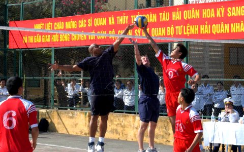 US Navy 071115-N-0807W-063 Sailors attached to mine warfare ship USS Patriot (MCM 7) and mine countermeasures ship USS Guardian (MCM 5) play a friendly game of volleyball with the members of the People's Army of Vietnam