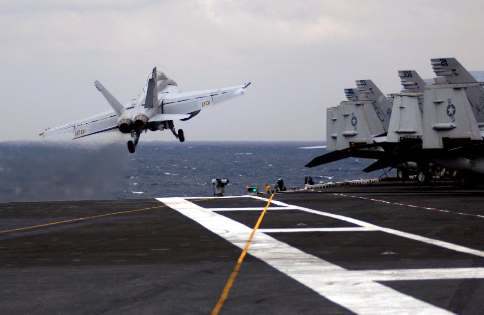 US Navy 071117-N-8923M-202 An F-A-18F Super Hornet, from the Swordsmen of Strike Fighter Squadron (VFA) 32, launches from the flight deck aboard the Nimitz-class nuclear-powered aircraft carrier USS Harry S. Truman (CVN 75)