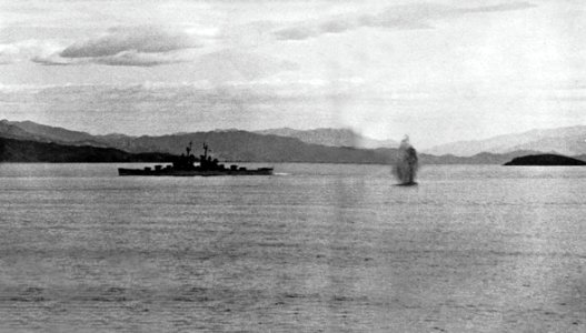 USS Bremerton (CA-130) under fire from North Korean shore batteries, in 1953