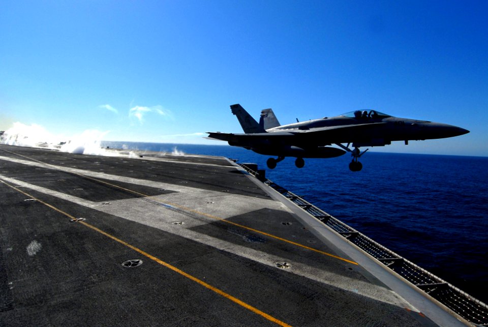 US Navy 071123-N-0684R-034 An F-A-18C Hornet assigned to the Argonauts of Fighter Strike Squadron One Four Seven (VFA-147) clears the flight deck of the Nimitz-class aircraft carrier USS John C. Stennis (CVN 74) after launch
