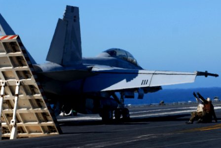 US Navy 071123-N-0684R-120 Final checkers give thumbs up signaling everything is safe just prior to an F-A-18F Super Hornet assigned to the Black Knights of Fighter Strike Squadron One Five Four (VFA-154) launching photo