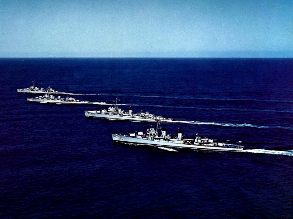 USS Braine (DD-630), USS Ingersoll (DD-652), USS Cogswell (DD-651) and USS Stoddard (DD-566) underway in the Pacific Ocean, circa in 1960