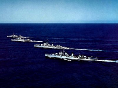 USS Braine (DD-630), USS Ingersoll (DD-652), USS Cogswell (DD-651) and USS Stoddard (DD-566) underway in the Pacific Ocean, circa in 1960