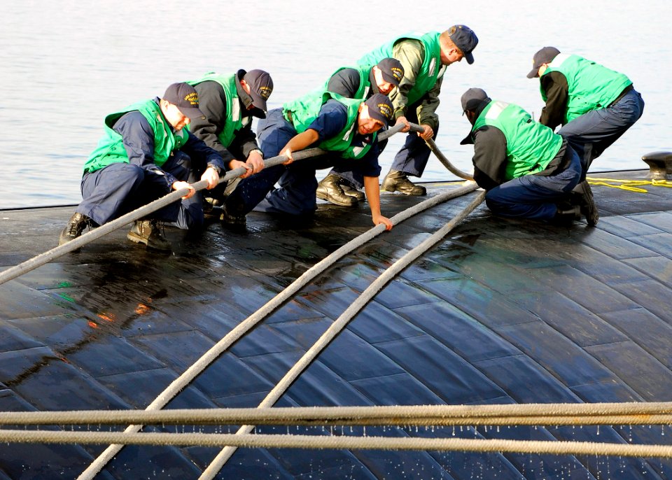 US Navy 071124-N-0780F-004 Sailors conduct mooring operations as the Los Angeles-class nuclear-powered submarine USS Montpelier (SSN 765) arrives pierside in Souda Harbor for a routine port visit