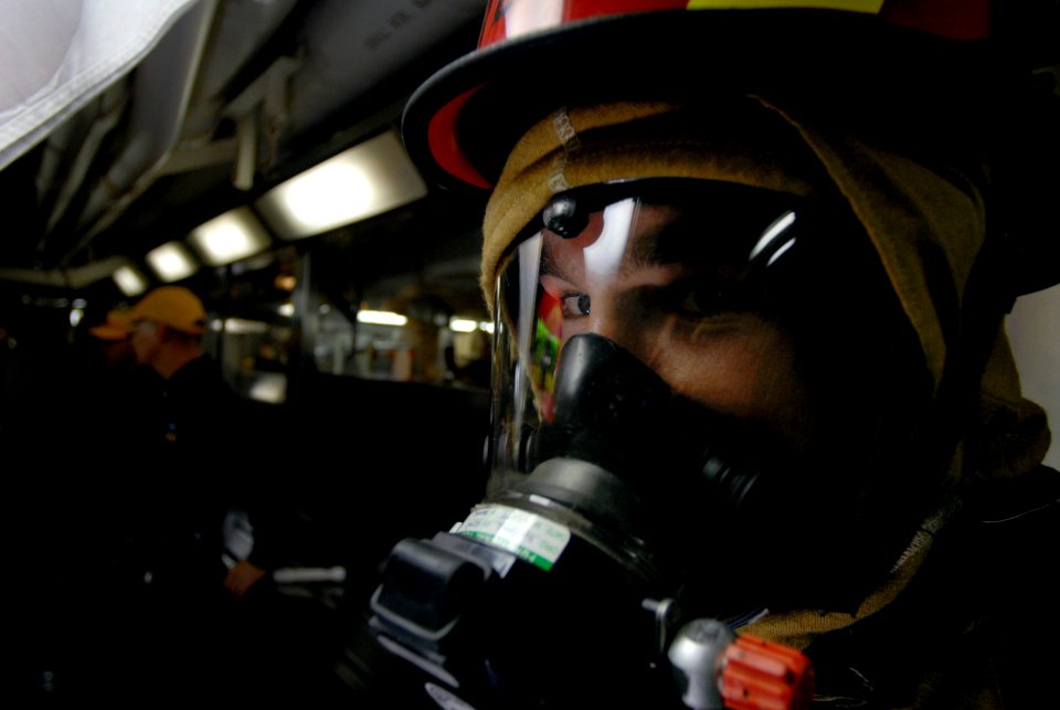 US Navy 071129-N-4776G-147 Electrician's Mate Drey DeVine sets the reflash watch during a repair locker drill aboard the Nimitz-class nuclear-powered aircraft carrier USS Ronald Reagan (CVN 76)