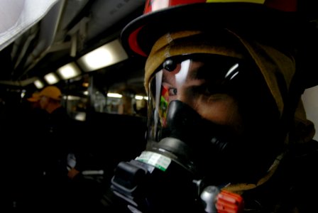 US Navy 071129-N-4776G-147 Electrician's Mate Drey DeVine sets the reflash watch during a repair locker drill aboard the Nimitz-class nuclear-powered aircraft carrier USS Ronald Reagan (CVN 76)