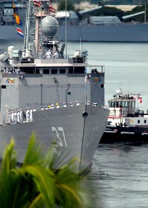US Navy 071127-N-4965F-003 Sailors aboard the Oliver Hazard Perry-class guided-missile frigate USS Crommelin (FFG 37) man the rails as the ship departs Naval Station Pearl Harbor