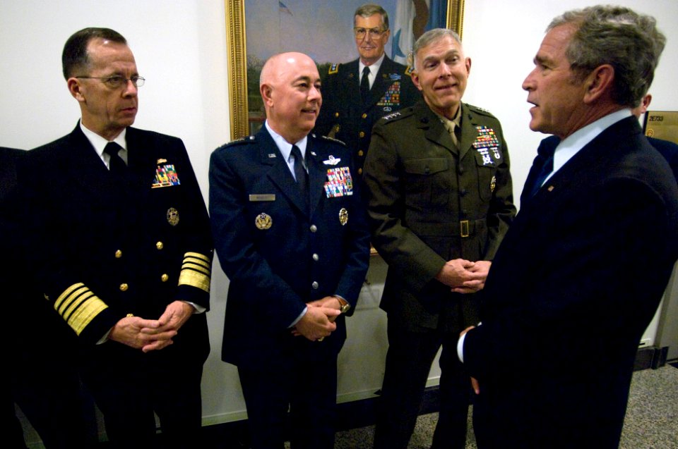 US Navy 071129-N-0696M-257 President George W. Bush speaks with Adm. Mike Mullen, Gen. Michael T. Mosley and Gen. James T. Conway, after a meeting with senior leaders discussing long-term strategic plans for the military
