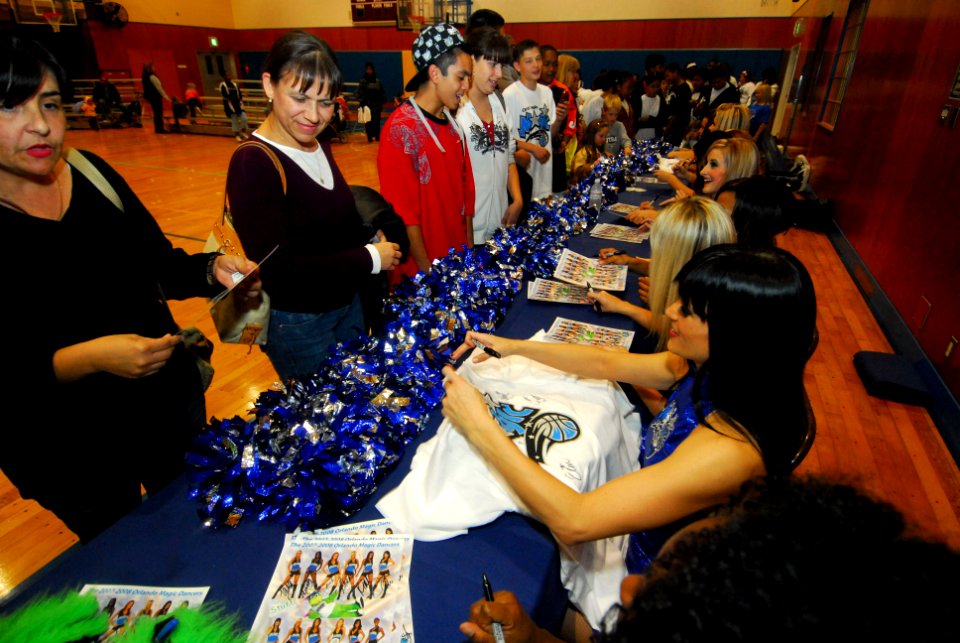 US Navy 071127-N-6936D-262 Members of the Orlando Magic Dancers sign autographs for Sasebo Sailors and their families during the Pacific-leg of an Armed Forces Entertainment tour