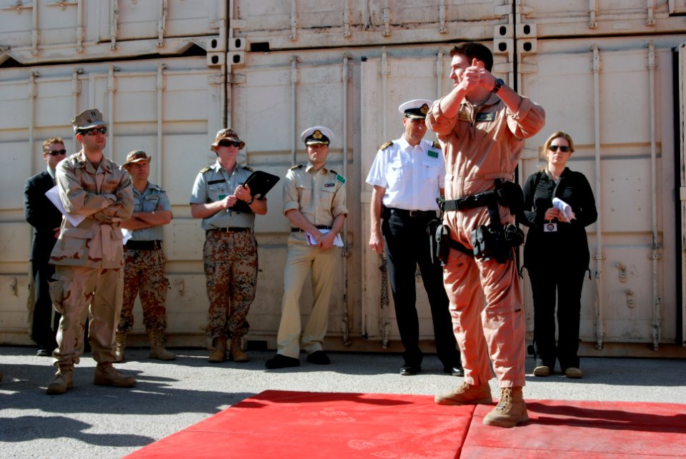 US Navy 071128-N-7095C-001 Information Technician 2nd Class Brendan Dunn demonstrates techniques used by Coast Guard boarding teams on patrol in the 5th Fleet area of responsibility to participants in the Combined Maritime Forc