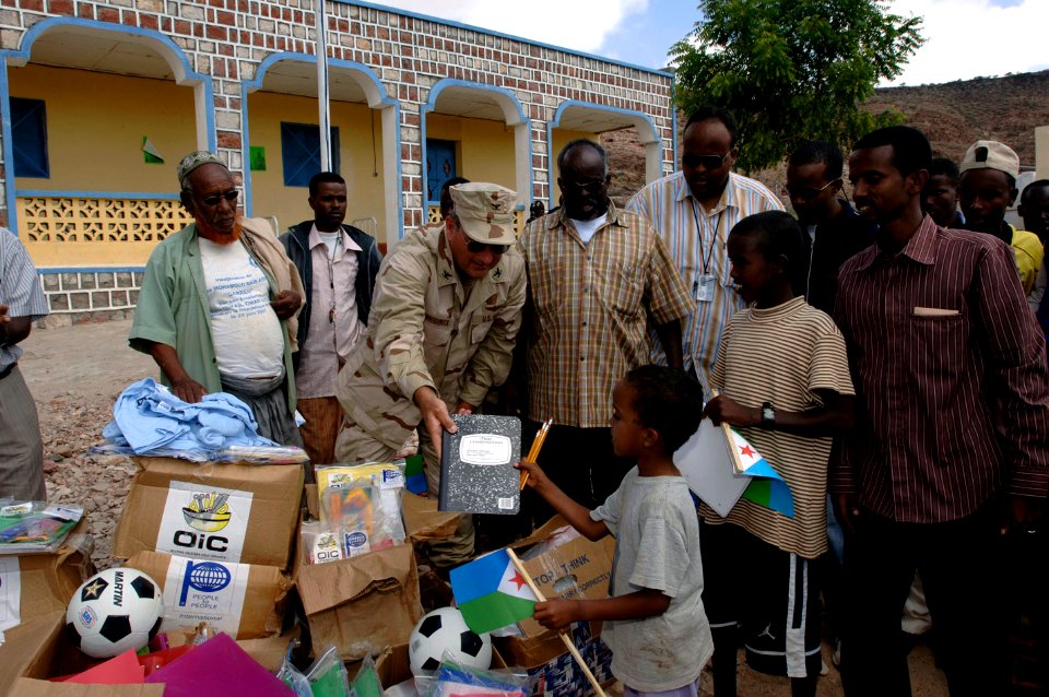 US Navy 071129-F-0509T-130 U.S. Navy Capt. Tom Broderick, dedication officer Combined Joint Task Force - Horn of Africa, donates school supplies following a dedication ceremony in Assamo, Djibouti